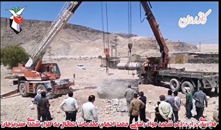 فیلم | جابه جایی مزار مطهر شهید جواد رضایی در کازرون