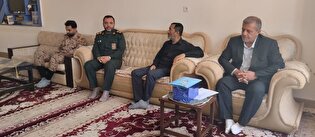 تجلیل از خانواده شهید خبرنگار حسن رضایی در سروستان